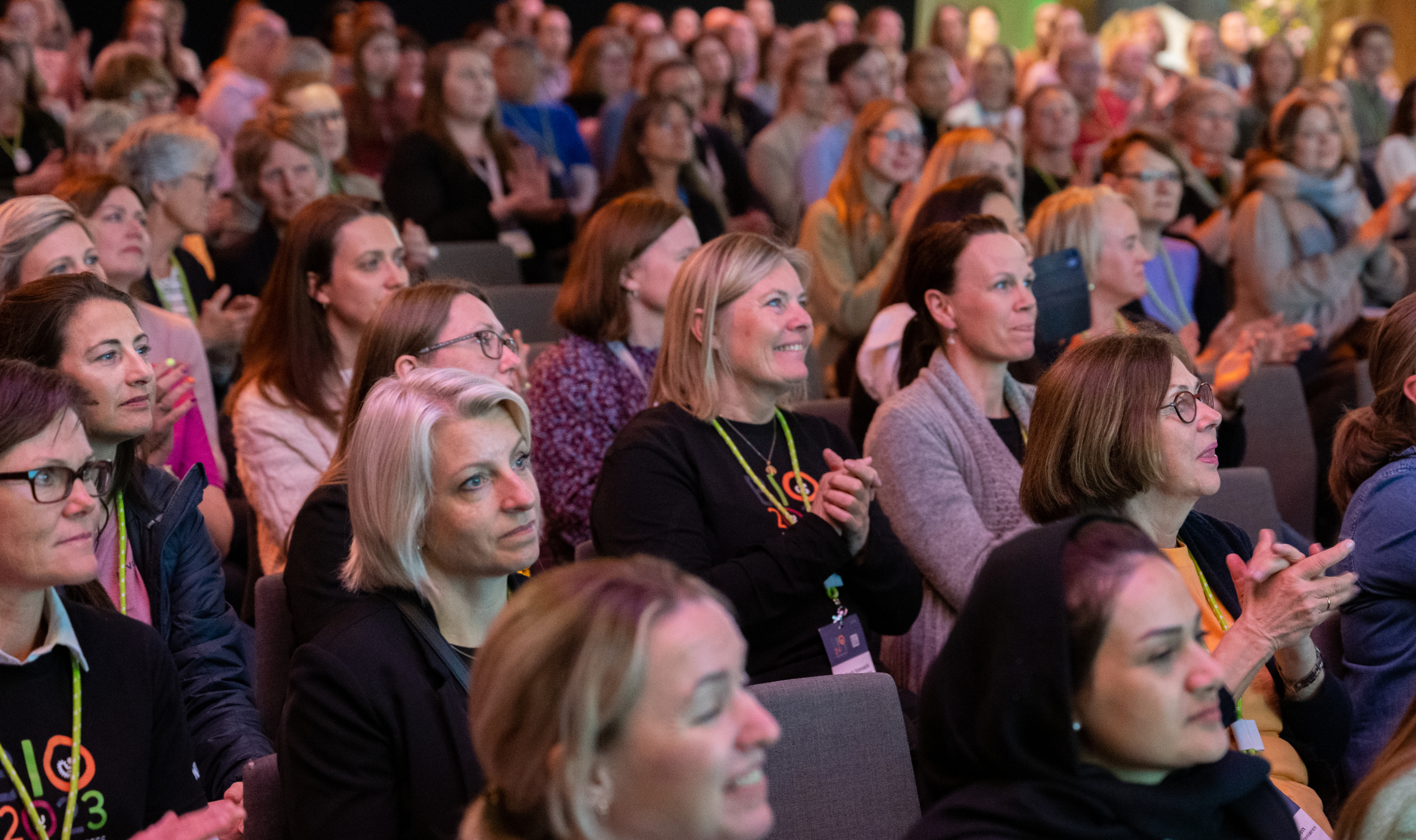 People sitting in a conference hall