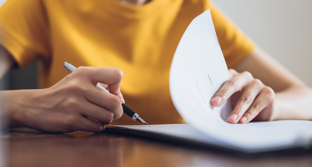 A person signs a contract